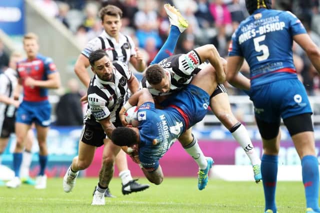 Rangi Chase, pictured in defensive action against Wakefield at this year's Magic Weekend. PIC: John Clifton/SWpix.com