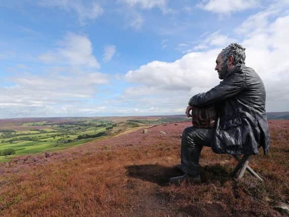 The Seated Man, a three-meter sculpture by Sean Henry, at Castleton Rigg, near Westerdale in the North York Moors National Park. Picture: Owen Humphreys/PA Wire