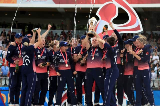 England celebrate with the trophy after winning the ICC Women's World Cup Final.