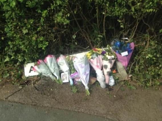 Flowers were laid at the scene of the crash on Arthurs Avenue, Harrogate, in August last year.