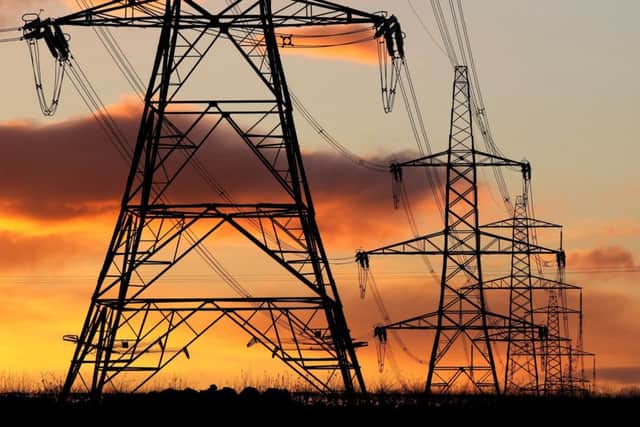 Library image of electricity pylons at sunset Photo: Andrew Milligan/PA Wire