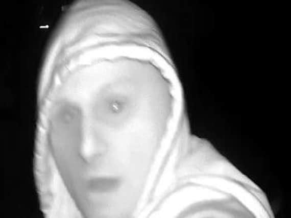 A CCTV image of one of the men police want to speak to.