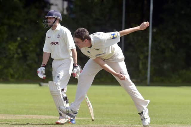 New Farnley bowler Andrew Brewster against Woodlands