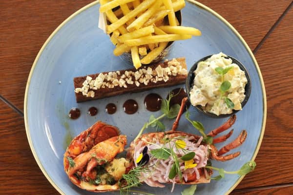 STAR IS BORN: Surf meets snout with belly pork and fresh lobster.
