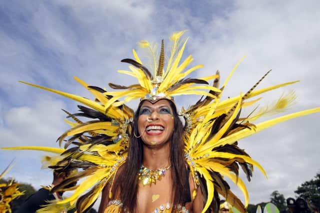 Nisha Pankhania takes part in the Leeds West Indian Carnival's 50th anniversary parade. Pictures: Simon Hulme