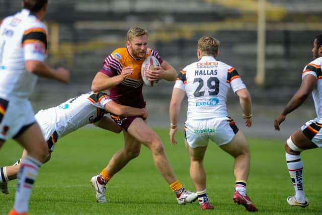 Batley's William Maher takes on the Bradford defence. PIC: James Hardisty