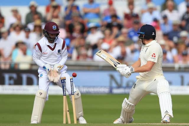 England's Jonny Bairstow can only watch as the ball clatters into his stumps after a reverse sweep went wrong on Monday at Headingley. Picture: Nigel French/PA