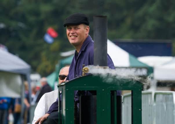 Ian Whitfield, of Cheshire, driving a 1906 Locomotive steam car engine on a 10.25" gauge portable miniature steam railway.