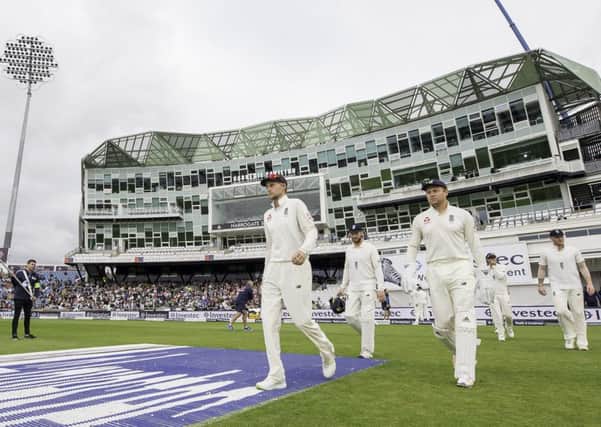 On home turf: England captain Joe Root leads his team out wirh Jonny Bairstow for the final day of the Test match at Headingley against the West Indies.