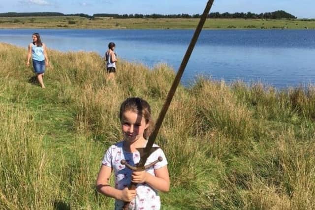 Matilda Jones with the 'Excalibur' sword she found.