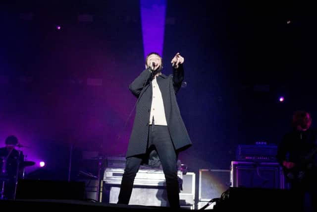 Tom Meighan of Kasabian on the main stage at Leeds Festival. Picture: Mark Bickerdike