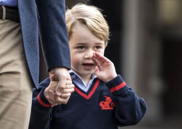 Prince George arrives with the Duke of Cambridge. PIC: PA