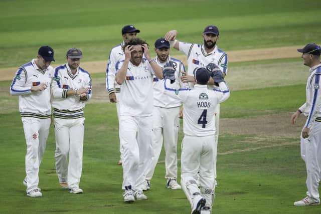 NICE WORK: Ryan Sidebottom is congratulated on dismissing Middlesex's Sam Robson. Picture: Allan McKenzie/SWpix.com