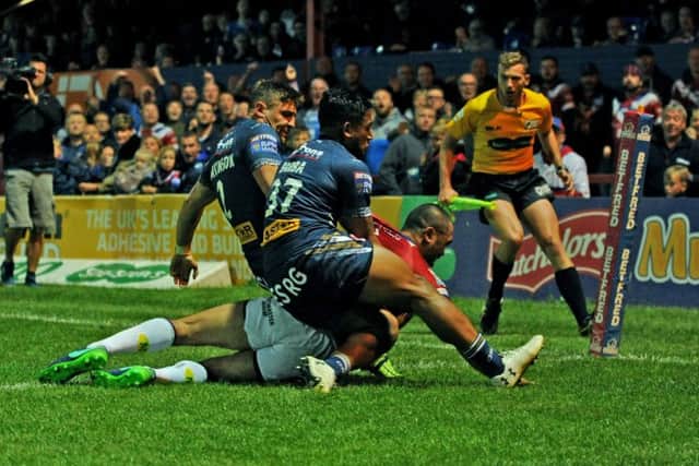Wakefield's Bill Toupou scores his first try. Picture Jonathan Gawthorpe
