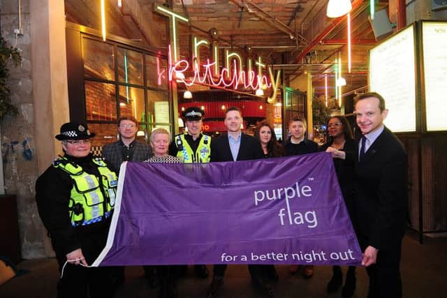 LeedsBID and other organisations celebrate the arrival of the Purple Flag earlier this year. Picture: Simon Hulme