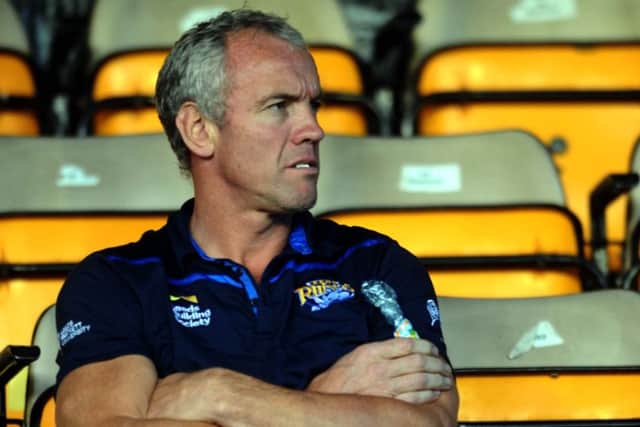 Brian McDermott watches from the stands.