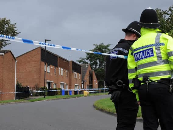 The scene in Wensley Street, Firth Park following the murder of a 31-year-old man. Picture: Andrew Roe
