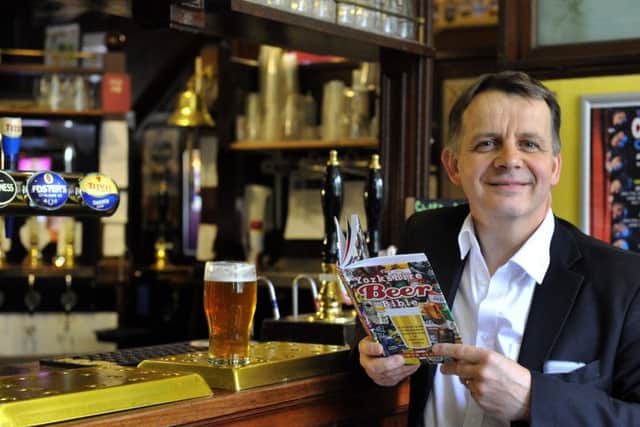 Simon Jenkins with his new book The Yorkishire Beer Bible.