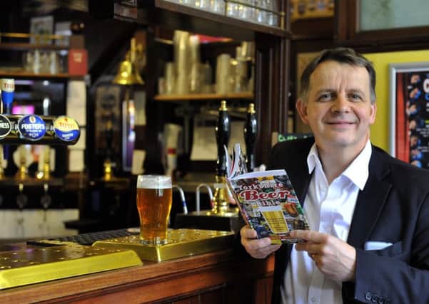 Simon Jenkins with his new book The Yorkishire Beer Bible.