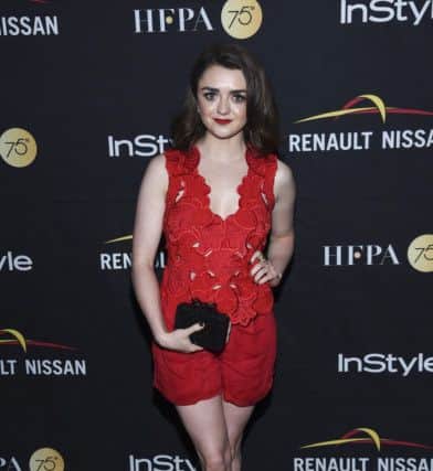 Maisie Williams in red at the the Toronto International Film Festival last weekend (Photo by Evan Agostini/Invision/AP).