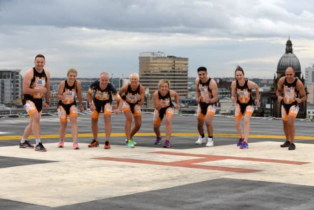 Trauma staff at the LGI get ready for a mammoth fundraising mission by taking part in the Weymouth Iron Man Triathlon this weekend.
Pictured on the helipad are William Bolton, Sarah Howard, Sophie Earle, Clare Bassett, Anthony Howard, Millad Ahmadi, Amy Lindh,,George Kleftouris.
12 September 2017. Picture Bruce Rollinson