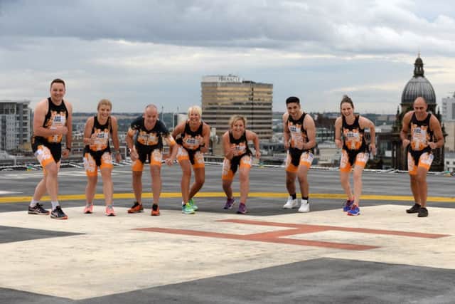 Trauma staff at the LGI get ready for a mammoth fundraising mission by taking part in the Weymouth Iron Man Triathlon this weekend.
Pictured on the helipad are William Bolton, Sarah Howard,  Sophie Earle, Clare Bassett,  Anthony Howard, Millad Ahmadi, Amy Lindh,,George Kleftouris.
12 September 2017.  Picture Bruce Rollinson