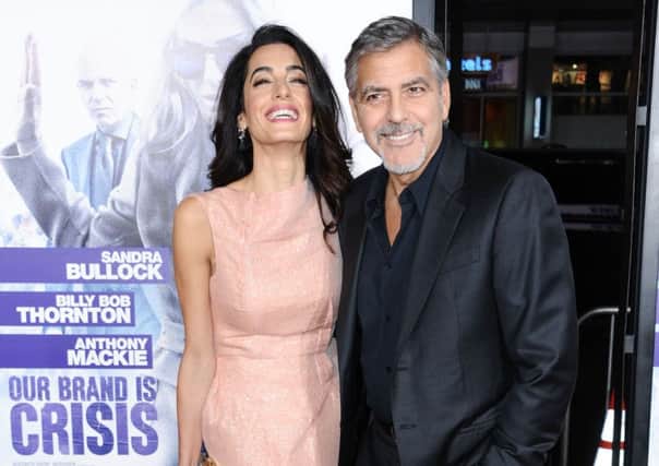 George and Amal Clooney. PIC: Richard Shotwell/Invision/AP