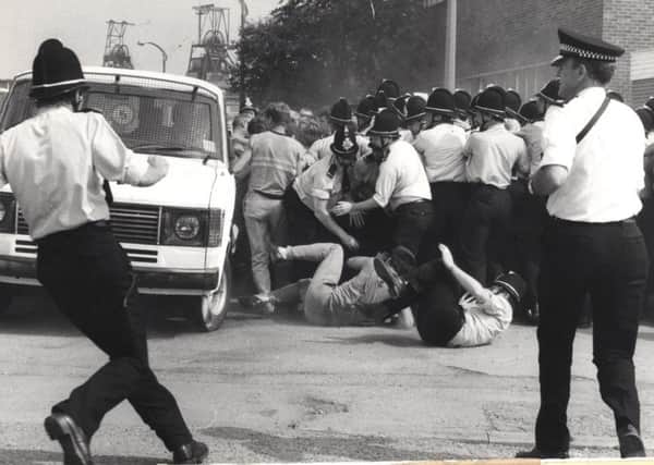 police and pickets on the ground when an unmarked van left Allerton bywater colliery. miners strike. 21st August 1984.