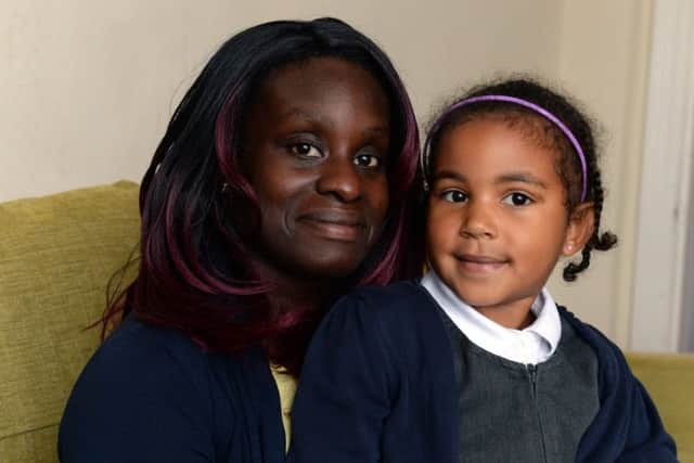 APPEAL: Valerie Roberts, pictured with her daughter Lisbeth, five, cleared Â£11,000 of debts. PIC: Bruce Rollinson