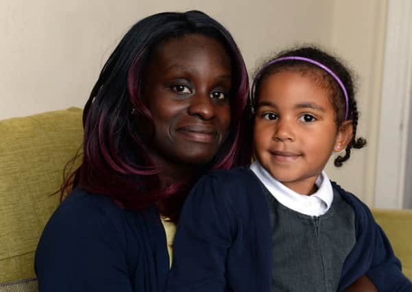 APPEAL: Valerie Roberts, pictured with her daughter Lisbeth, five, cleared Â£11,000 of debts. PIC: Bruce Rollinson