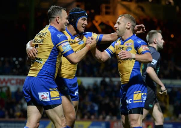 Danny McGuire celebrates scoring the Leeds Rhinos second try against Salford.