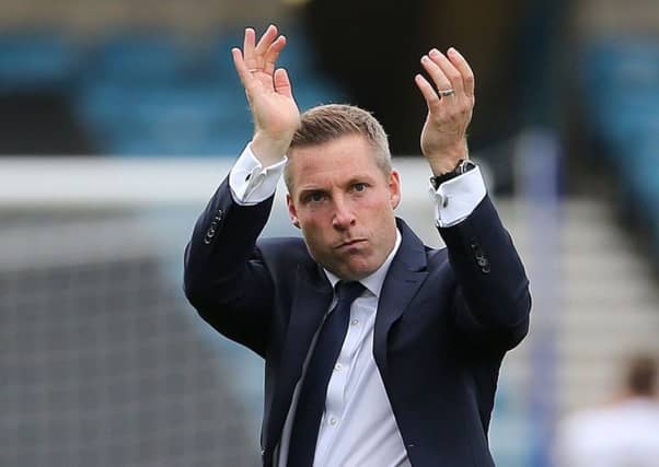 Millwall manager Neil Harris applauds the fans after the Sky Bet Championship match at The Den. PIC: Mark Kerton/PA Wire