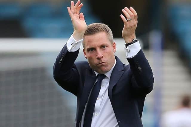 Millwall manager Neil Harris applauds the fans after the Sky Bet Championship match at The Den. PIC: Mark Kerton/PA Wire