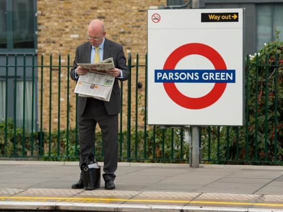Back to normal this morning as commuters take the train at Parsons Green.