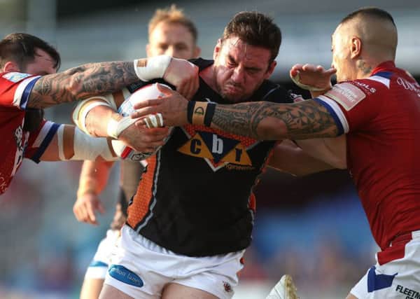 Castleford Tigers' Grant Millington in no-nonsense action against neighbours Wakefield Trinity. PIC: Simon Cooper/PA Wire