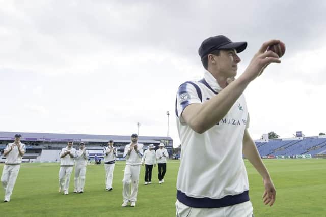 Yorkshire's Matthew Fisher is congratulated on taking 5 wickets in the innings against Warwickshire.