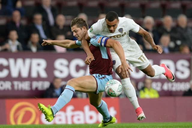 Jay-Roy Grot and James Tarkowski challenge for the ball.
at Turf Moor  Picture: Bruce Rollinson