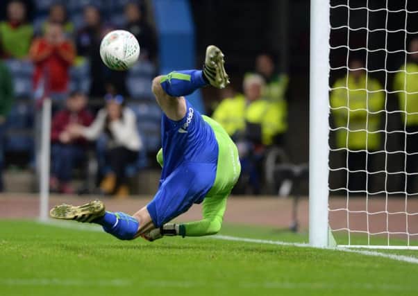 PENALTY SAVE: Andy Lonergan in action. PIC: Bruce Rollinson