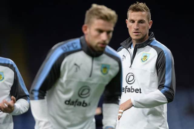Charlie Taylor and Chris Wood warming up ahead of the Carabao Cup clash against Leeds United. PIC: Bruce Rollinson
