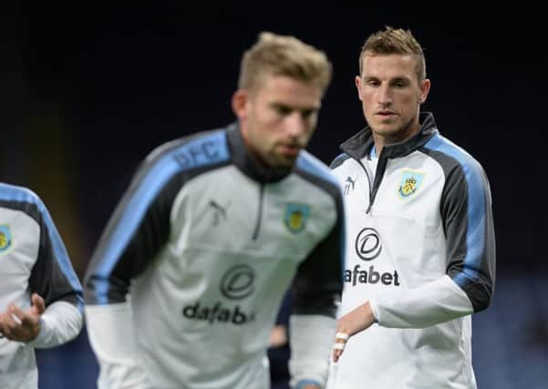 Charlie Taylor and Chris Wood warming up ahead of the Carabao Cup clash against Leeds United. PIC: Bruce Rollinson