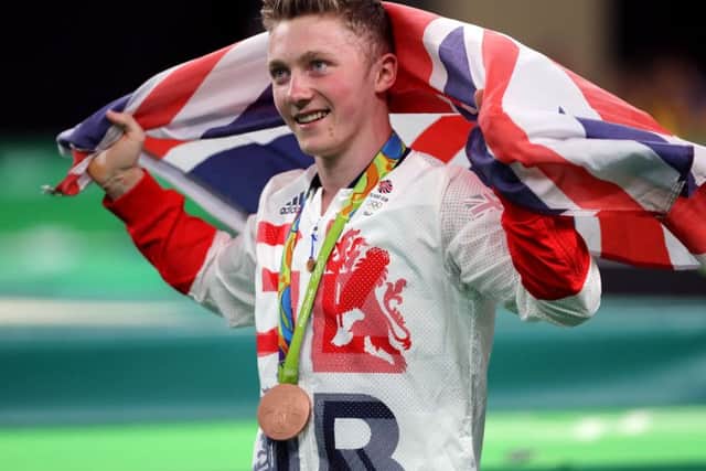 Great Britain's Nile Wilson celebrates winning a bronze medal in the men's horizontal bar at the Rio Olympics Games (Picture: Owen Humphreys/PA Wire)