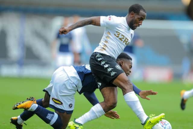 Vurnon Anita, of Leeds United, plays the ball infront of Fred Onyededinma, of Millwall (Picture: James Hardisty)