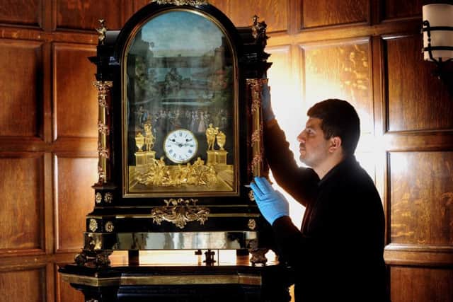 Visitors Assitant Mehdi looks at the Pyke Clock which once belonged to Queen Marie Antoinette of France, at Temple Newsam House, Leeds.19th September 2017 ..Picture by Simon Hulme