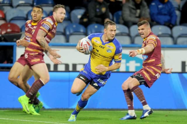 Danny Mcguire strolls in for one of his two tries against Huddersfield. Picture: Steve Riding.