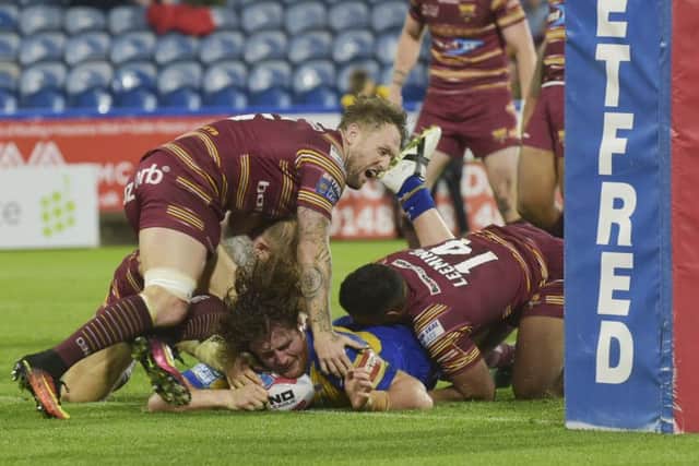 Anthony Mullally gets his just rewards at Huddersield with a try. Picture: Steve Riding.