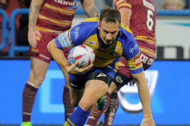 Danny McGuire scored two tries as Leeds Rhinos thrashed Huddersfield Giants (Picture: Steve Riding)