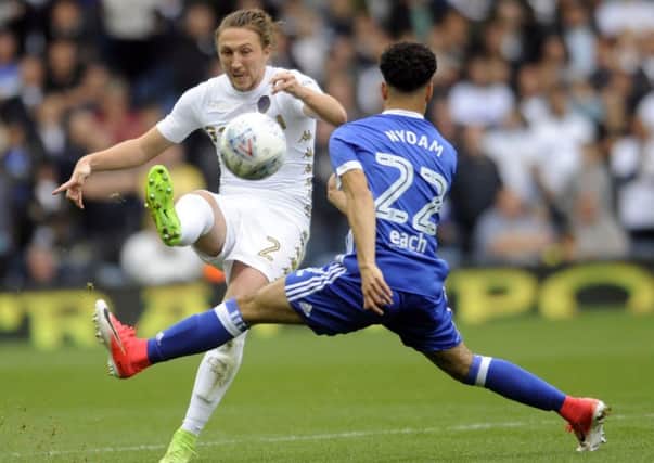 IMPRESSIVE: Leeds United's Luke Ayling is challenged by Tristan Nydam as part of another fine display for the Whites. Picture by Simon Hulme.