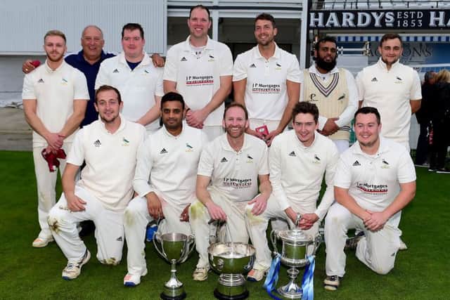 Hanging Heaton celebrate winning the Yorkshire Premier League.