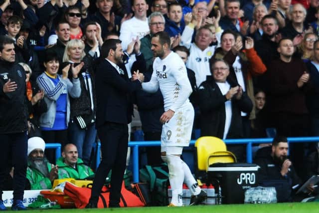 TOP START: Leeds United head coach Thomas Christansen thanks Pierre-Michel Lasogga as he leaves the pitch on his debut against Burton Albion.