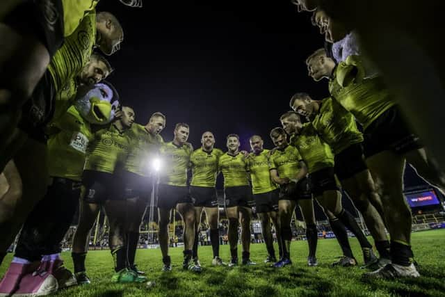Final push: Hull FC players celebrate victory at Castleford.
Picture: Allan McKenzie/SWpix